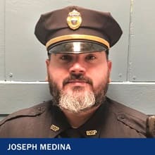 Boston Police Sgt. Joseph Medina, a 2017 online criminal justice degree graduate, in uniform.