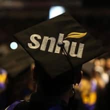The top of a graduation cap decorated with the SNHU logo.