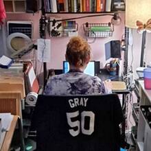 Loretta Gray doing coursework at her home office in Virginia.