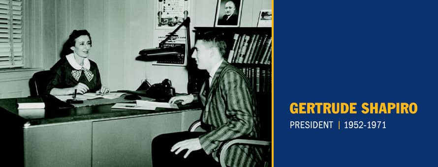 Gertrude Shapiro speaking with a student in her office and the text Gertrude Shapiro, President 1952-1971