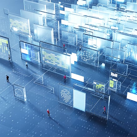 A room full of computer screens showing the complexity of AI and computer science.