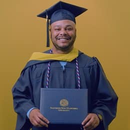 Cules Rose '25, bachelor's in finance graduate from SNHU.