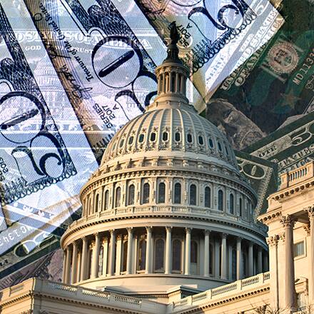 United States Capital building with a collage of money behind it.