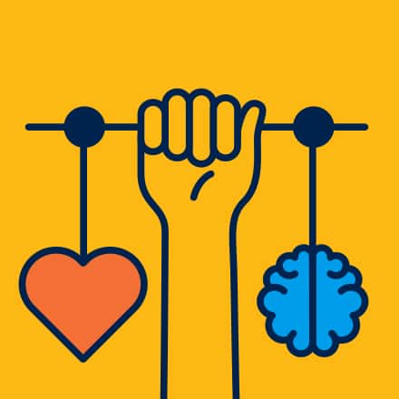 A yellow background with a cartoon hand holding a scale with a cartoon brain on one side and a heart on the other