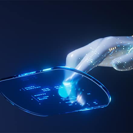 A futuristic robot hand touching a floating glass screen.