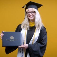 Gigi Bell, a 2025 bachelor's in business administration graduate from SNHU.