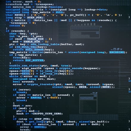 A black screen with blue, white and yellow code.