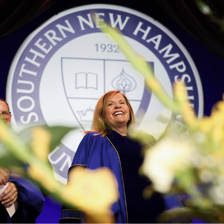 President Lisa Marsh Ryerson smiling on stage at inauguration ceremony.