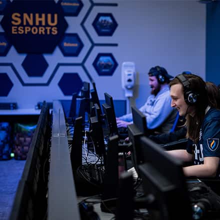 Members of SNHU's esports team playing during the SNHU x USO military gaming tournament.