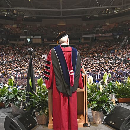 SNHU President Dr. Paul J. LeBlanc making a commencement address at the SNHU Arena.