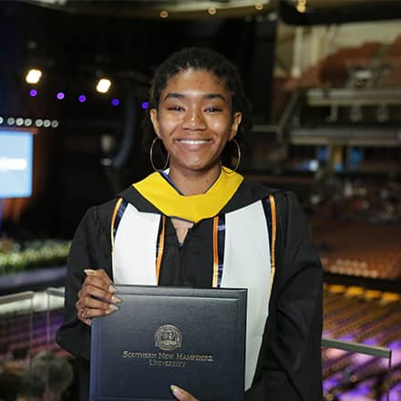 Tanner McCarthy, a 2023 campus graduate with her bachelor's degree in mechanical engineering from SNHU.