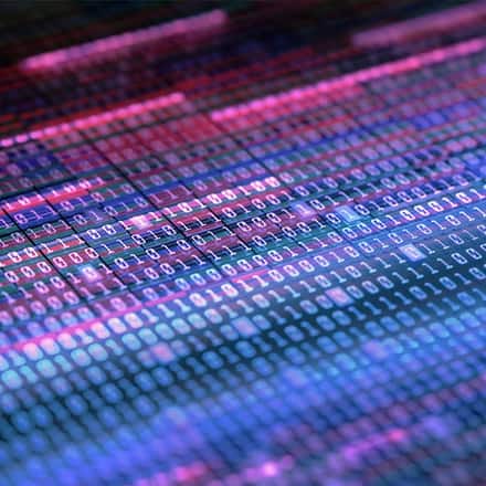 A series of digital ones and zeros in various shades of purple, pink and blue.