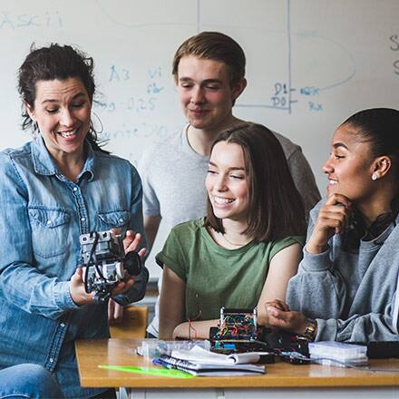 A teacher shows students what STEM means in education