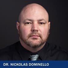 Dr. Nickolas Dominello with the text Dr. Nickolas Dominello