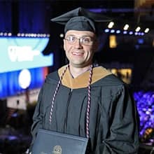 Father Bill Gelinas attending SNHU spring Commencement 2023