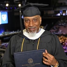 Father Billy Moore attending SNHU spring Commencement 2023