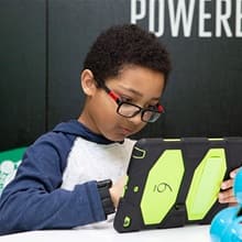 A Green Acres Elementary School student working on an iPad during the unveiling of a technology lab at the school.