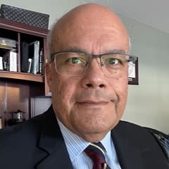 Dr. Chris M. Mendoza, an adjunct instructor at SNHU and marketing and business consultant.