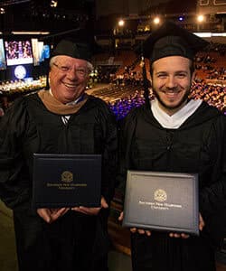Edward and Michael Galasso at SNHU's 2018 commencement.