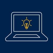 An icon of a laptop with a yellow lightbulb on its screen