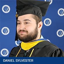 2023 SNHU online environmental science degree graduate Daniel Sylvester clad in cap and gown
