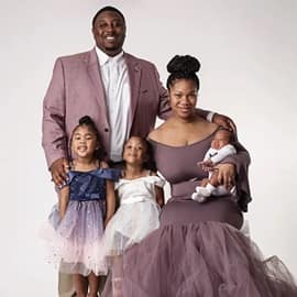 Darryl Johnson and his wife with their three children.