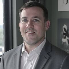Dr. Dennis Backherms, an Information Technology (IT) professional and associate dean of cybersecurity programs at SNHU.