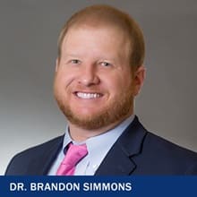 Dr. Brandon Simmons with text Dr. Brandon Simmons