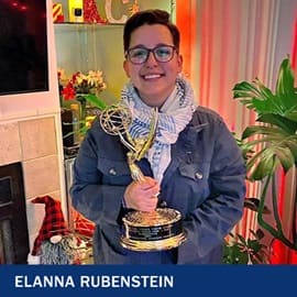 Elanna Rubenstein holding an Emmy with the text Elanna Rubenstein