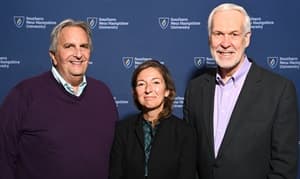 From left to right: outgoing SNHU Board Chair Mark Ouellette, SNHU Board Chair Winnie Lerner and SNHU President Paul LeBlanc