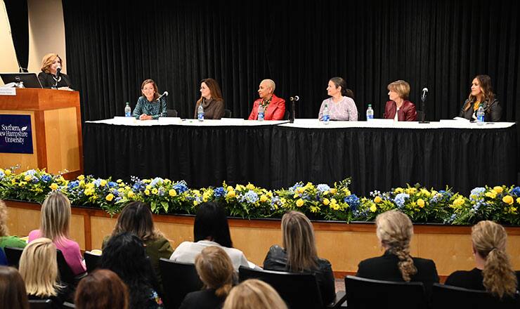 SNHU Chief Experience Officer Sue Nathan moderating the Women on Board panel of six SNHU Board of Trustees