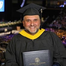 Father Frederico Curty attending SNHU spring Commencement 2023