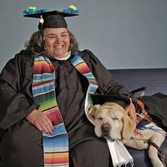 Heather Schey with their dog Asher.