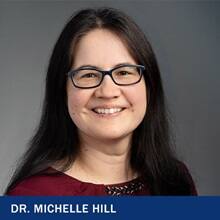 Dr. Michelle Hill with the text Dr. Michelle Hill