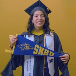 Jennifer Guayllazaca '25G, Master of Science (MS) in Management with a concentration in Construction Management graduate from SNHU, holding a New York state pennant, holding an SNHU pennant.