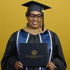 Joi Taylor, a 2021 graduate from SNHU with a bachelor's in business administration who is earning an MBA with a concentration in Leadership.