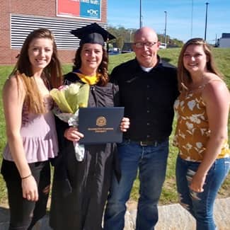 Katina at graduation with her family