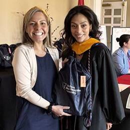 Sonali Mukerjee, SNHU director of partnerships and military marketing, left, with graduate Lorna Perez, right.