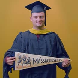 Luke Blaeser, a 2025 SNHU grad who earned his master's in healthcare administration holding a Massachusetts state flag in front of a yellow background.