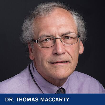Dr. Thomas MacCarty with text Dr. Thomas MacCarty
