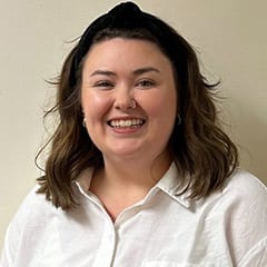 Maggie Aubin, an AI integration specialist and English composition instructor at SNHU, with an MFA in Fiction.