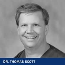 Dr. Thomas Scott with the text Dr. Thomas Scott