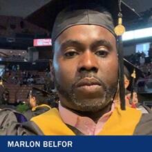 Marlon Belfor at graduation with text Marlon Belfor