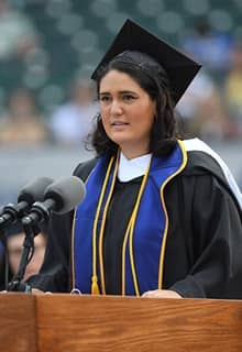 An snhu student giving a speech at commencement 