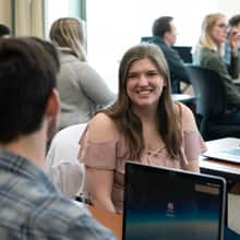 A group of SNHU students in a classroom setting