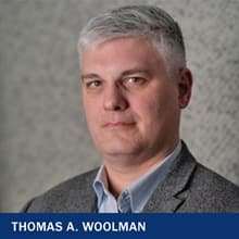 Thomas A. Woolman with the text Thomas A. Woolman