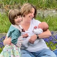 Tevera Holcomb Hesslink with both children, Joel and Juline, in a lavender field. 