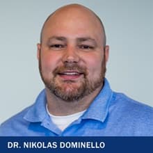 Dr. Nikolas Dominello with the text Dr. Nikolas Dominello