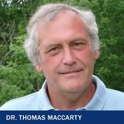 Dr. Thomas MacCarty with text Dr. Thomas MacCarty