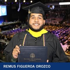 Remus Figueroa Orozco wearing a graduation cap and gown to celebrate his bachelor’s degree in cybersecurity from SNHU
